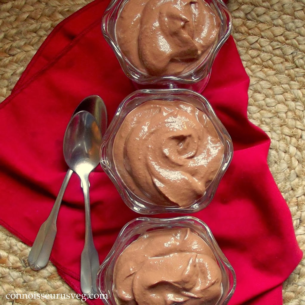 Three Dishes on Vegan Chocolate Mousse with Red Napkin and Spoons