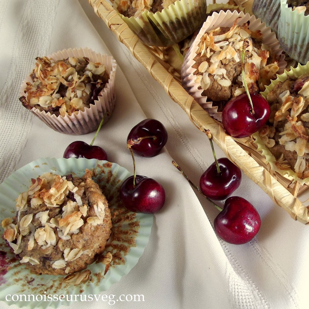 Cherry Oatmeal Muffins in a Basket and On a Tablecloth with Scattered Cherries