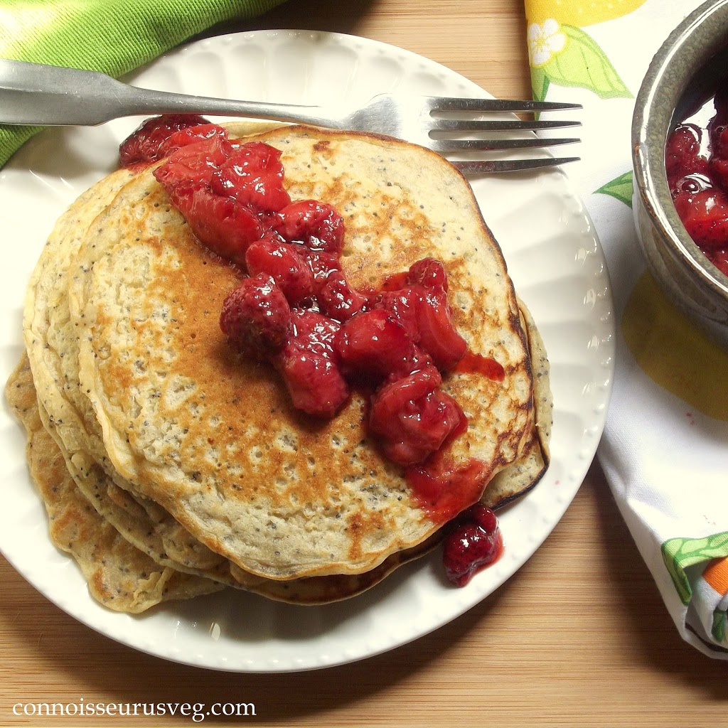 Overhead View of a Plate of Quinoa Pancakes with Roasted berries on Top