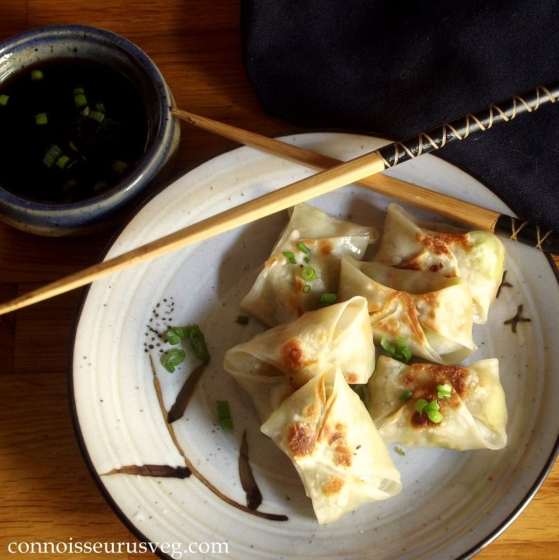 Overhead View of Wontons on a Plate with Chopsticks