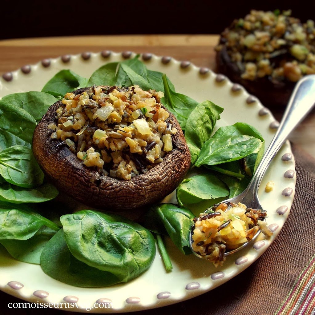 Stuffed Portobello Cap on a Plate with Greens and Spoon