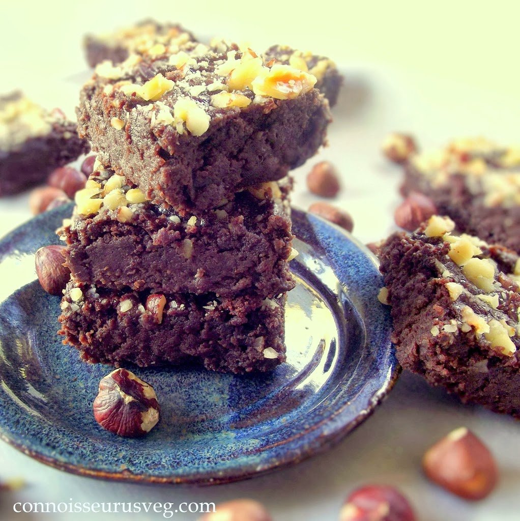 Stack of Hazelnut Brownies on a Blue Plate