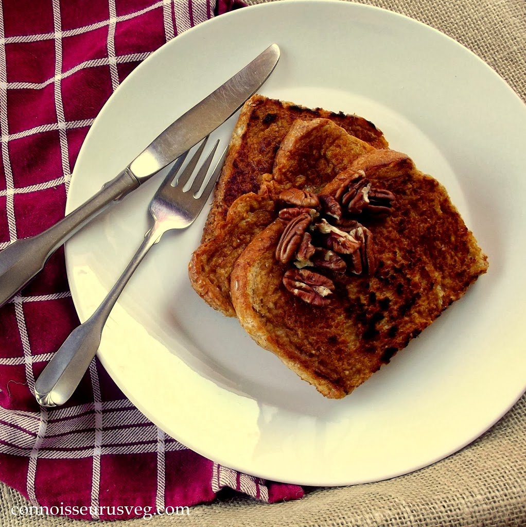 Overhead View of Two Slices of Sweet Potato French Toast on a Plate with Fork and Knife