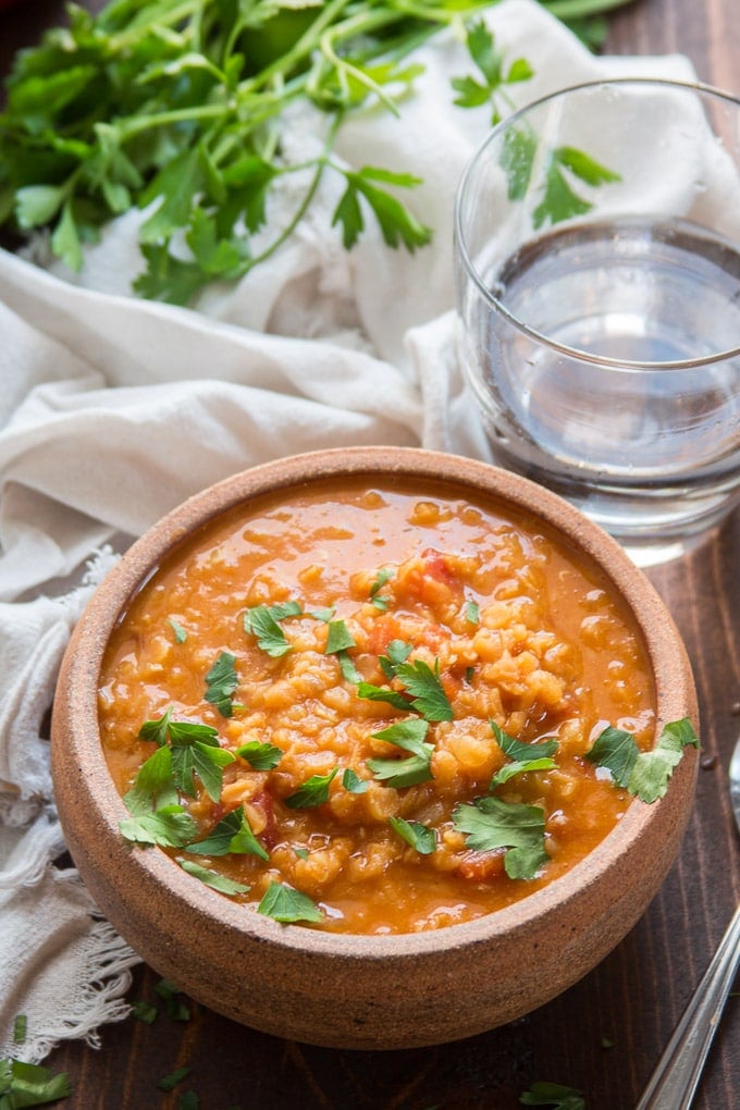 Mediterranean Red Lentil Soup in a Bowl Topped with Parsley