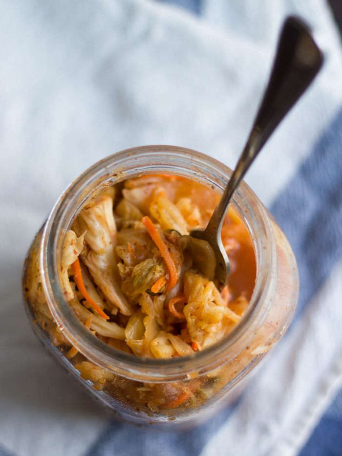 Jar of Kimchi with a Fork Sticking Out