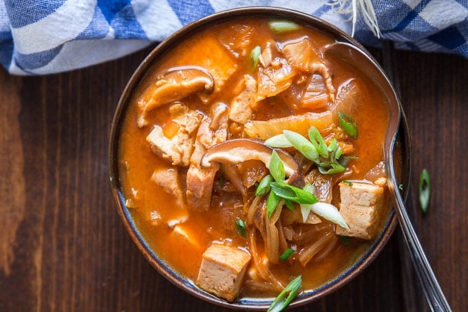 Overhead View of a Bowl of Kimchi Stew with Spoon