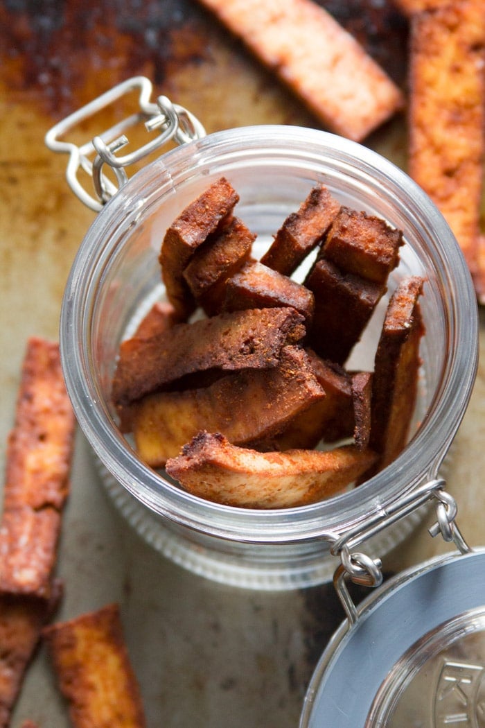 Spicy Sriracha Tofu Jerky in a Jar with the Lid Removed