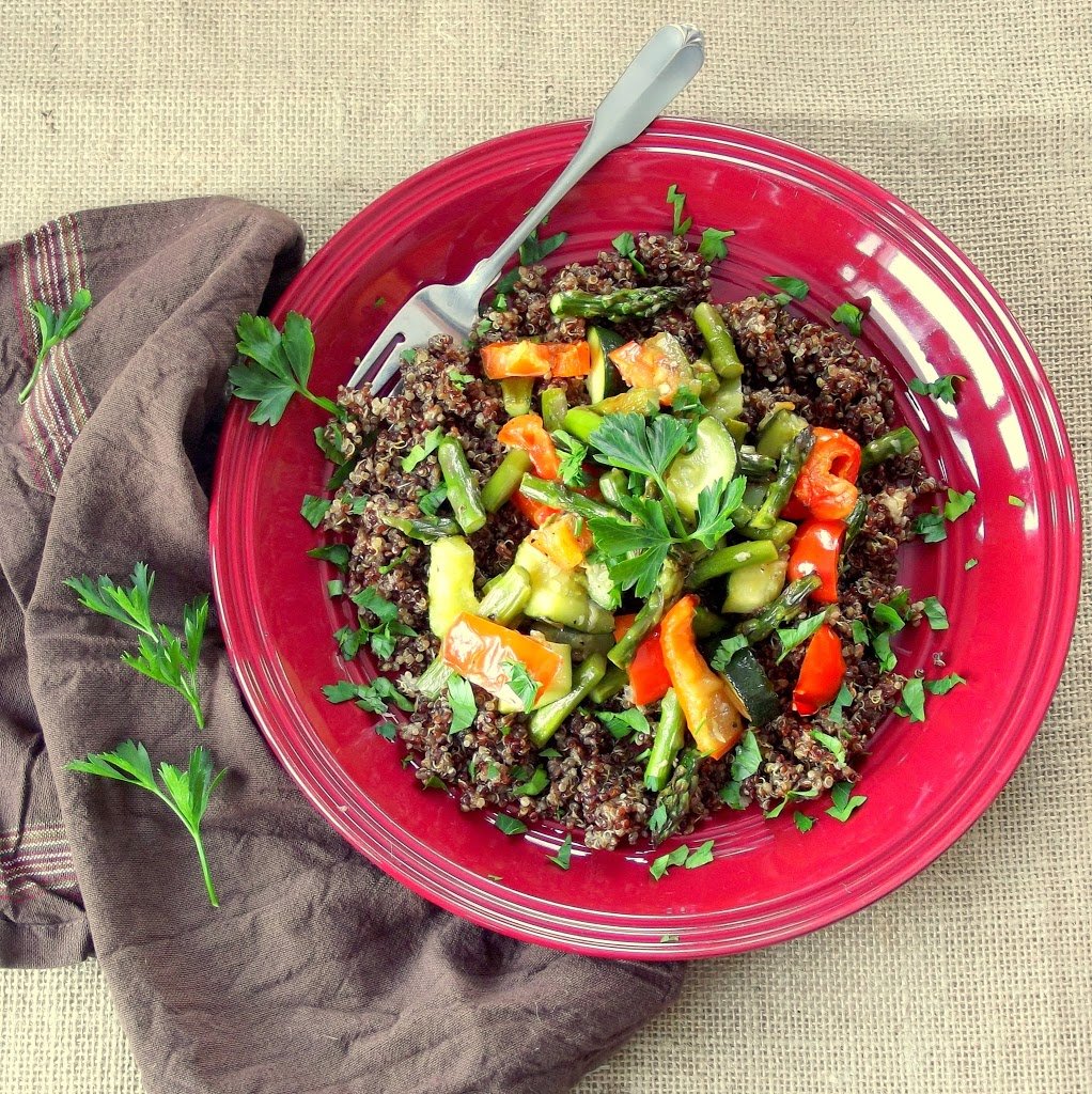 Overhead View of a Bowl of Quinoa and Veggies with Fork