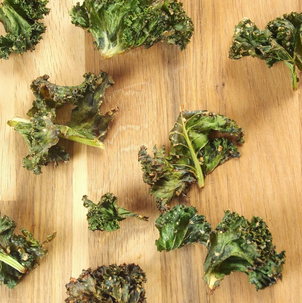 Kale Chips on a Wooden Surface
