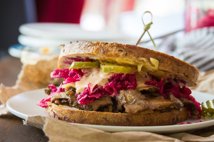 Close Up of a Vegan Reuben Sandwich on a Plate