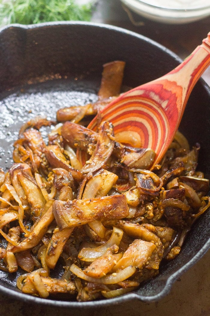 Eggplant Gyro Filling in a Skillet with Wooden Spoon