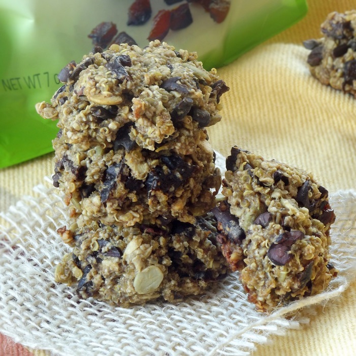 Stack of Vegan breakfast Cookies with bag of Dried Plums in the Background