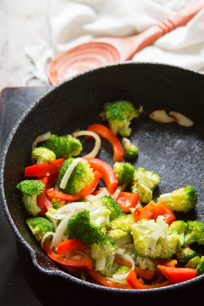 Broccoli, Peppers and Onions Sizzling in a Skillet