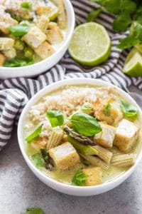 Two Bowls of Vegan Thai Green Curry with Tofu and Veggies