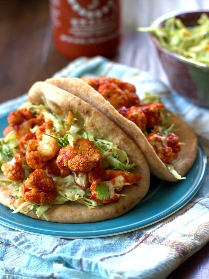 Close up of Two Barbecue Cauliflower Pitas on a Plate