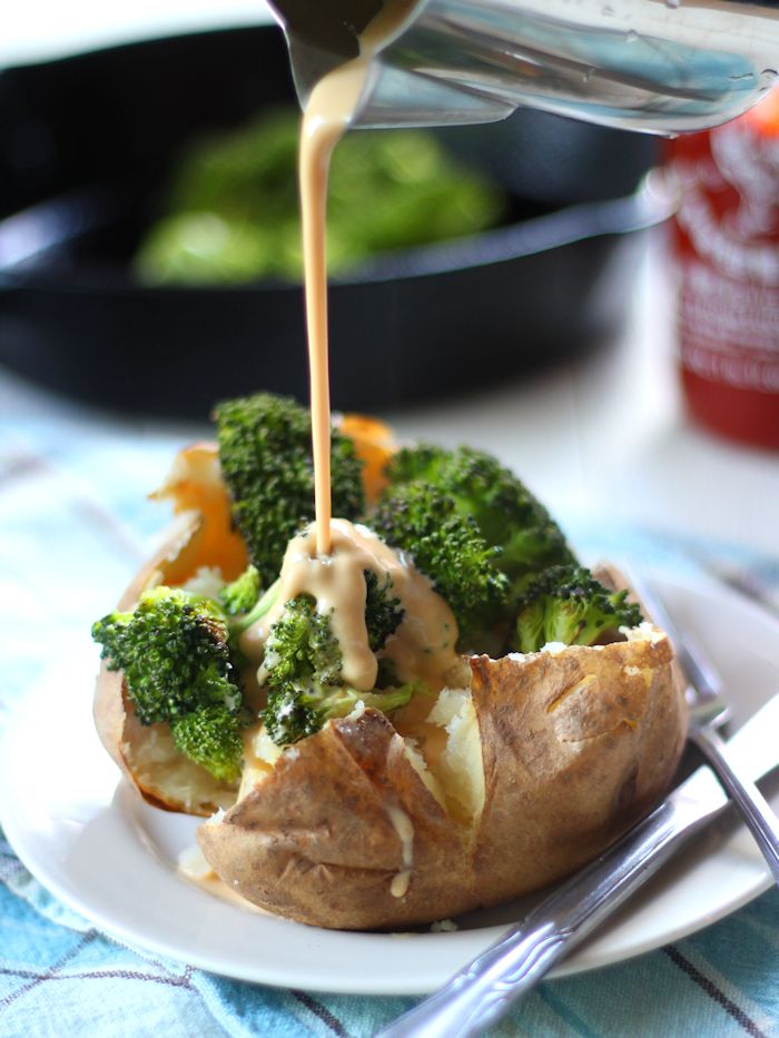 Garlic Roasted Broccoli Stuffed Potatoes with Tahini Cheese Sauce