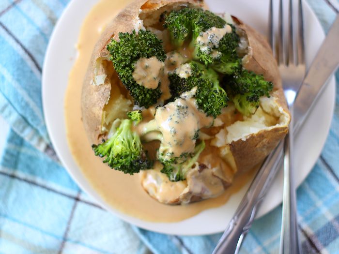 Garlic Roasted Broccoli Stuffed Potatoes with Tahini Cheese Sauce