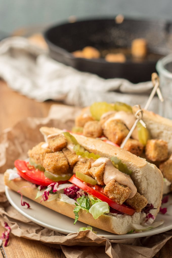 Vegan Vegan 'Po Boy Sandwich on a Plate with Skillet in the Background