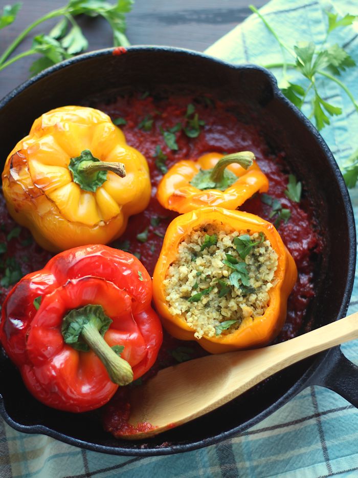Four Falafel Stuffed Peppers in a Skillet with Tomato Sauce