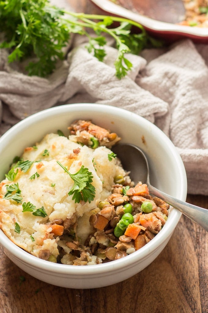 Bowl Filled with a Serving of Vegan Shepherd's Pie with Spoon