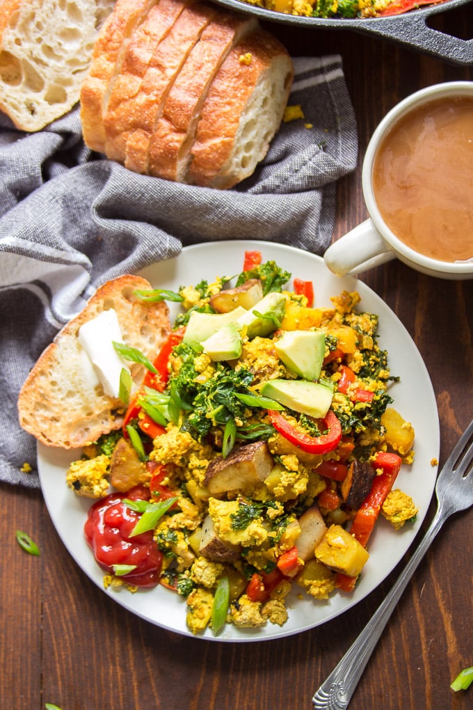 Plate of Tofu Scramble with Napkin, Bread and Coffee Cup