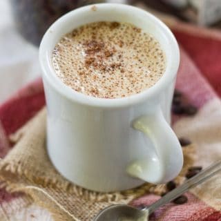Mug of Vegan Latte Topped with Cinnamon