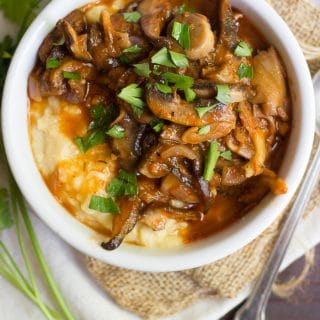 Overhead View of a Bowl of Creamy Polenta Topped with Mushroom Ragu