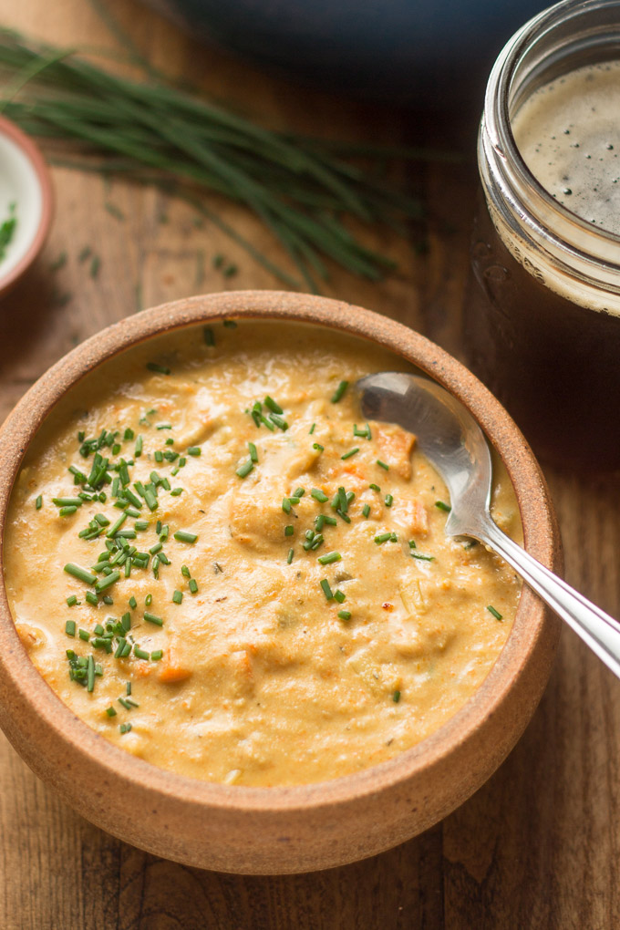 Vegan Beer Cheese Soup in a Bowl Topped with Chives