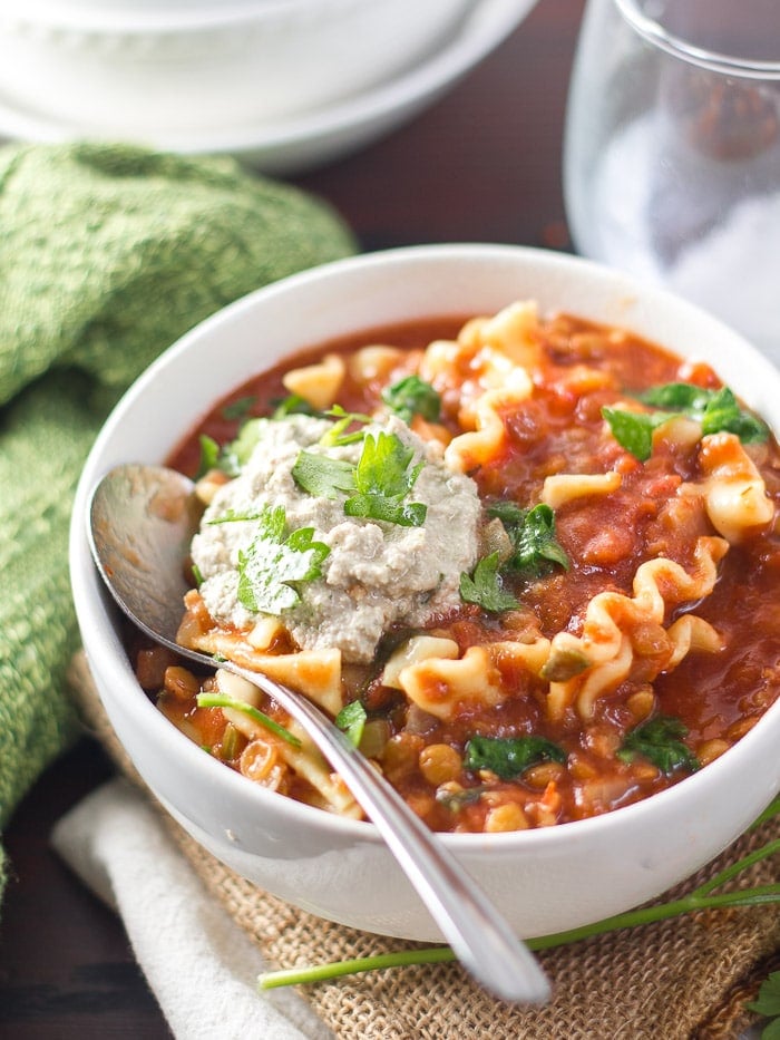 Bowl of Vegan Slow Cooker Lasagna Soup with Spoon