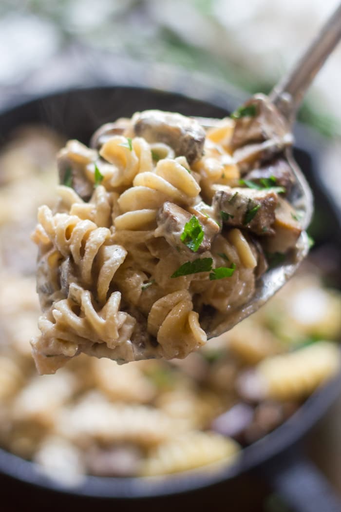Close Up of a Serving Spoon Filled with Vegan Mushroom Stroganoff
