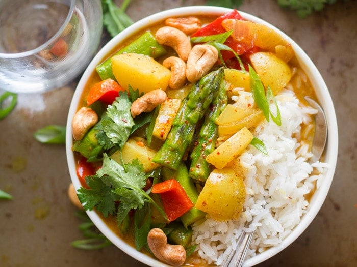Overhead View of a Bowl of Golden Spring Vegetable Thai Curry and Rice
