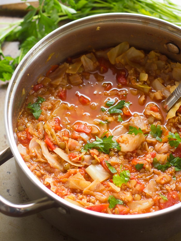 Vegan Cabbage Roll Soup in a Pot with Serving Spoon