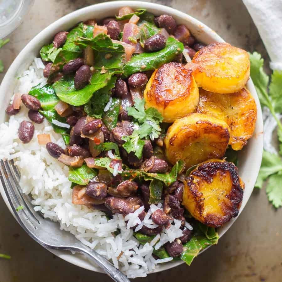 Bowl of Cuban rice and beans with plantains.