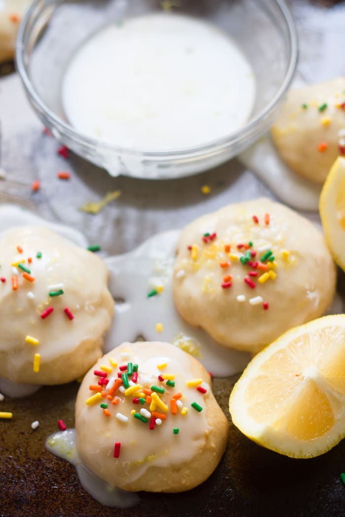 Close Up of Vegan Lemon Ricotta Cookies Covered with Frosting and Sprinkles
