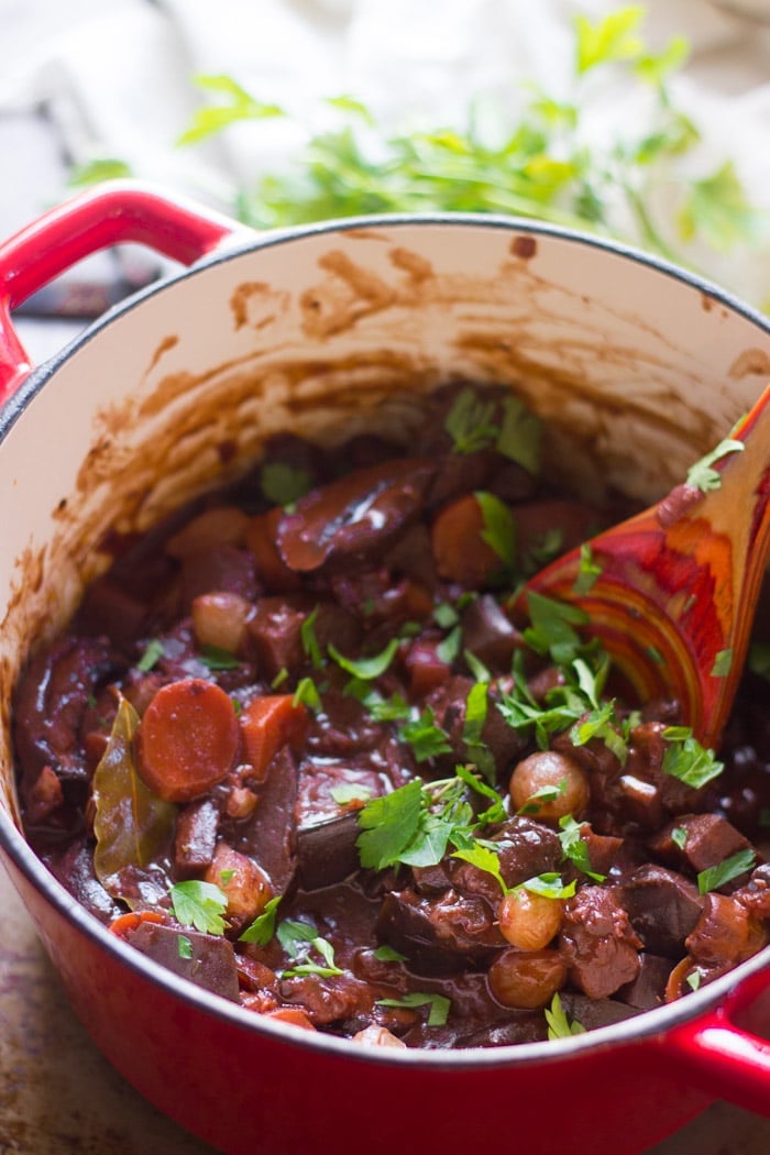Eggplant Bourguignon in a Pot with Wooden Spoon