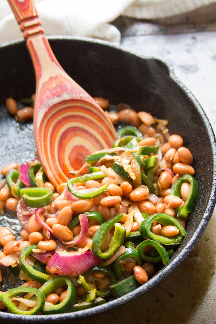 Pinto Beans, Onions and Peppers in a Skillet