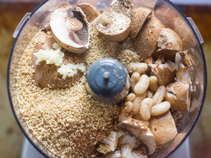 Ingredients for Making Vegan Swedish Meatballs in a Food Processor Bowl.