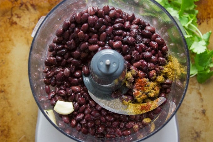 Black Beans with Garlic and Spices in a Food Processor Bowl