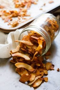 Jar Lying on Its Side Spilling out Coconut Bacon
