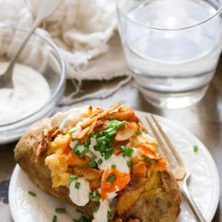 Vegan Twice Baked Potato on a Plate with Fork