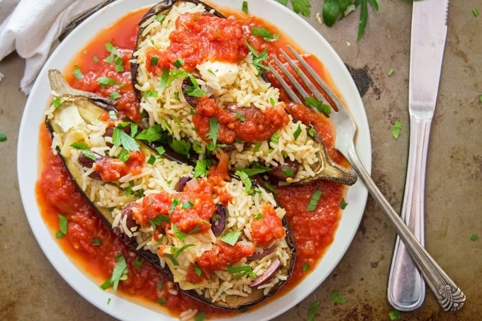 Close Up of Mediterranean Stuffed Eggplant on a Plate with Fork