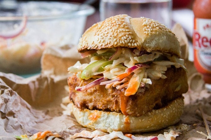 Close Up of a "Chicken" Fried Tofu Sandwich with Spicy Buffalo Slaw