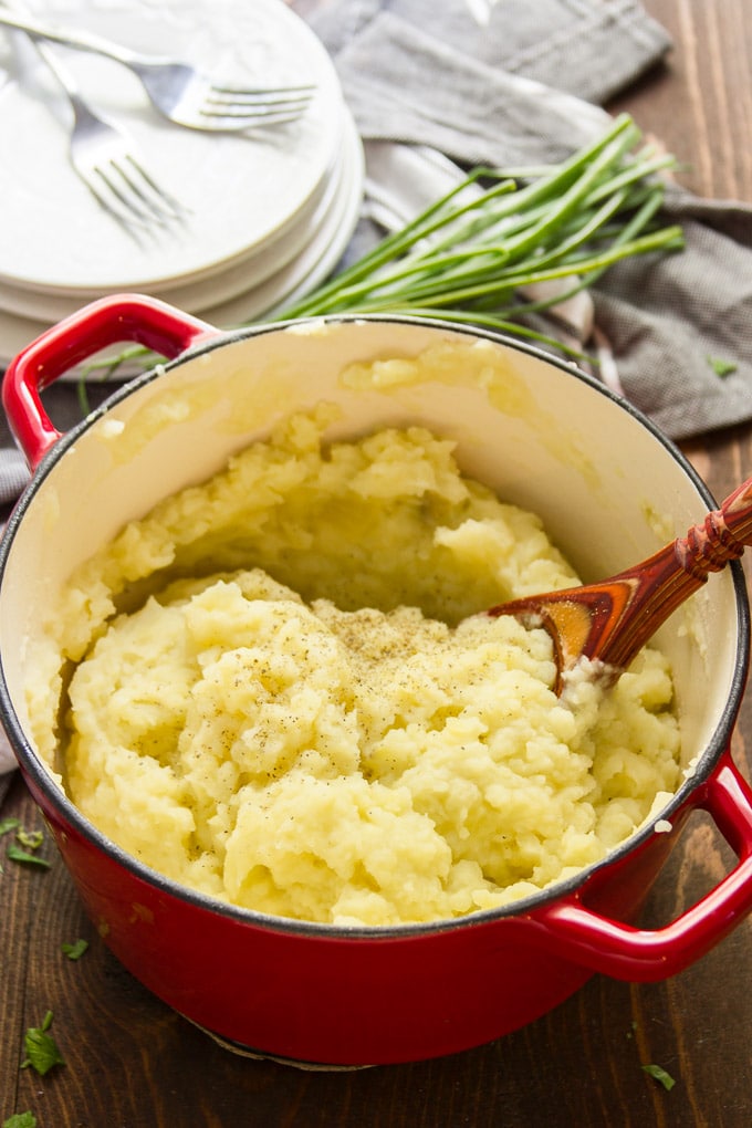 Pot Filled with Truffled Mashed Potatoes with Serving Spoon
