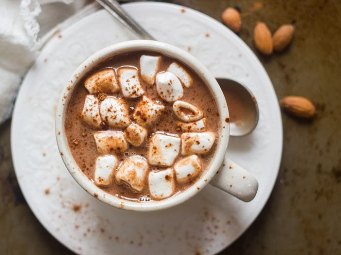 Overhead View of a Cup of Vegan Hot Chocolate with Marshmallows and Spoon