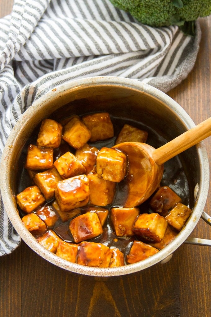 Teriyaki Tofu in a Saucepan with Serving Spoon