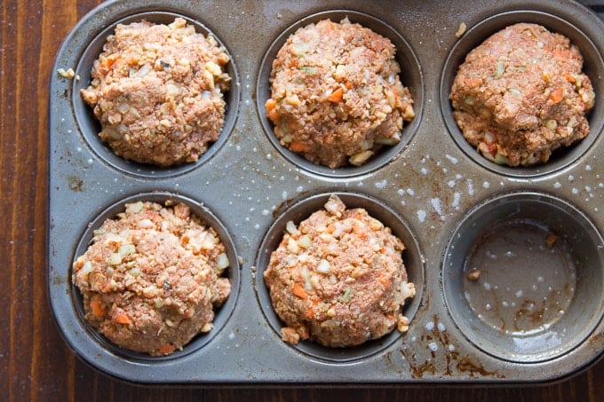 Muffin Tin Filled with Mixture for Making Italian-Style Vegan Meatloaf Muffins Before Baking