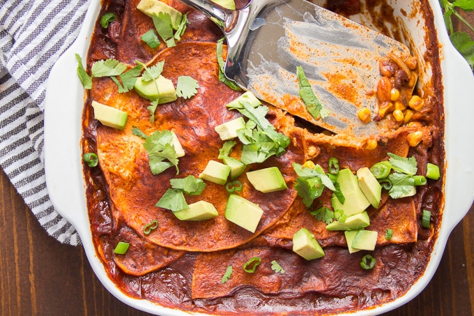 Loaded Enchilada Casserole in a Baking Dish with Serving Spatula