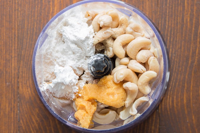 Ingredients for Vegan Cheese Sauce in a Food Processor Bowl