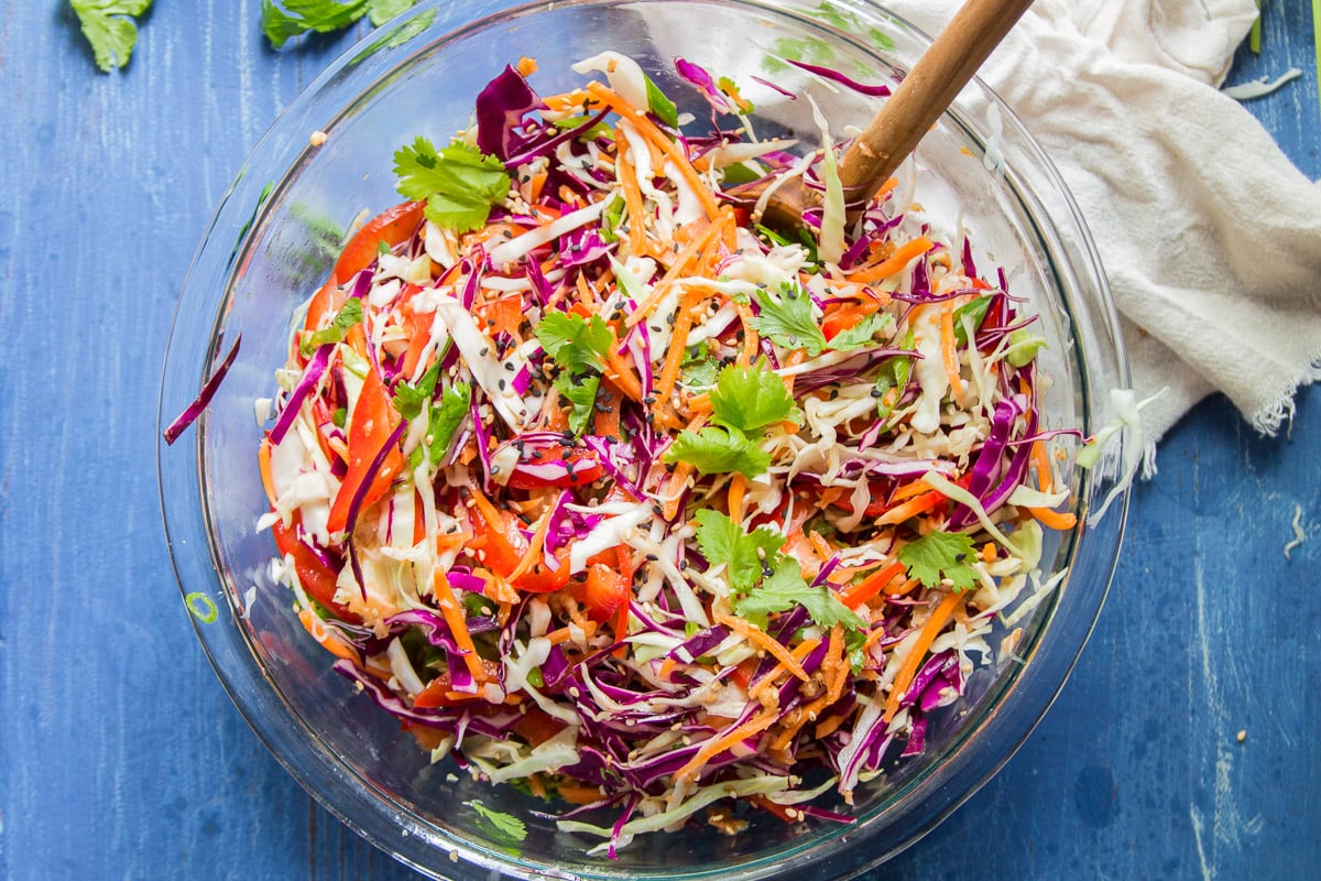 Bowl of Asian Slaw with Wooden Spoon