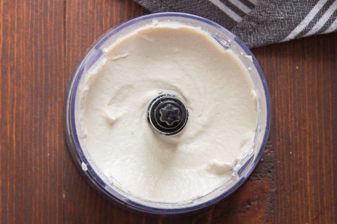 Cashew Cream Just After Blending in a Food Processor Bowl